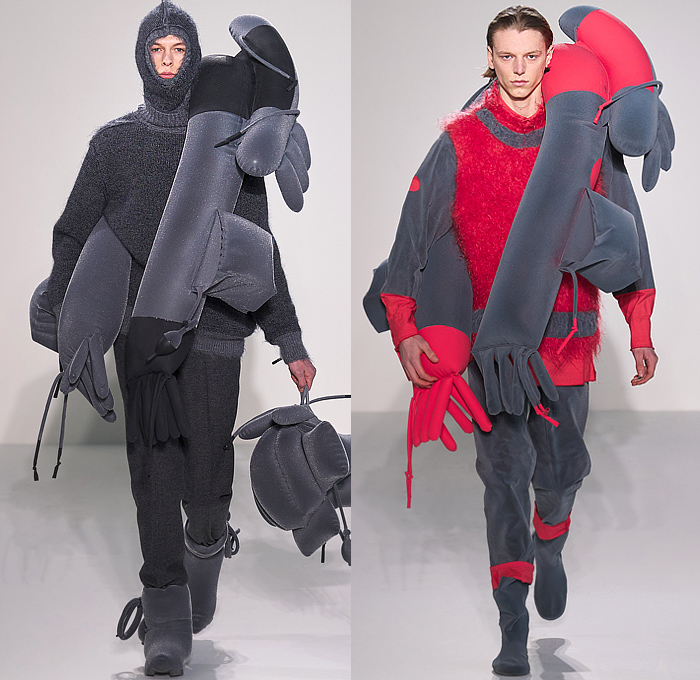 Craig Green 2022-2023 Fall Autumn Winter Mens Runway Looks - Cardboard Roll Inflatable Raft Chunky Knit Weave Mesh Tubes Sling Sweater Sculpture Wool Furry Pads Curves Frequency Honeycomb Cupcake Hem Bib Hoodie Outerwear Coat Parka Anorak Windbreaker Straps Pocket Valves Corduroy Quilted Puffer Sheen Modular Layers Baggy Tapered Pants Onesie Coveralls Jumpsuit Handbag Boot Gaiters Covers Bucket Hat Frontpack Balaclava Cow Udders