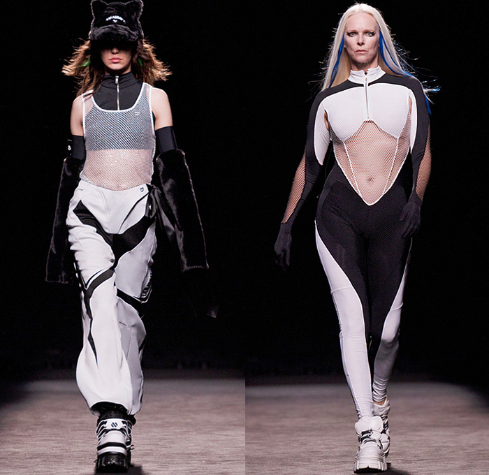 Dominnico 2022-2023 Fall Autumn Winter Womens Runway Looks - Mercedes-Benz Fashion Week Madrid MBFW - Lover Cross - Hearts Gown Cutout Lace Embroidery Plants LeavesSheer Mesh Frankenstein Shoulders Tweed Crop Top Midriff Fur Crystals Mesh Tank Top Trackwear Biker Pants Onesie Catsuit Unitard  Motorcycle Jacket Bicycle Shorts Bralette Flapper Fringes Coat Wide Leg Parachute Skirt Puff Ball Ski Mask Balaclava Choker Corset Bear Ears Hat Handbag Elevator Boots Metal Spikes Gloves