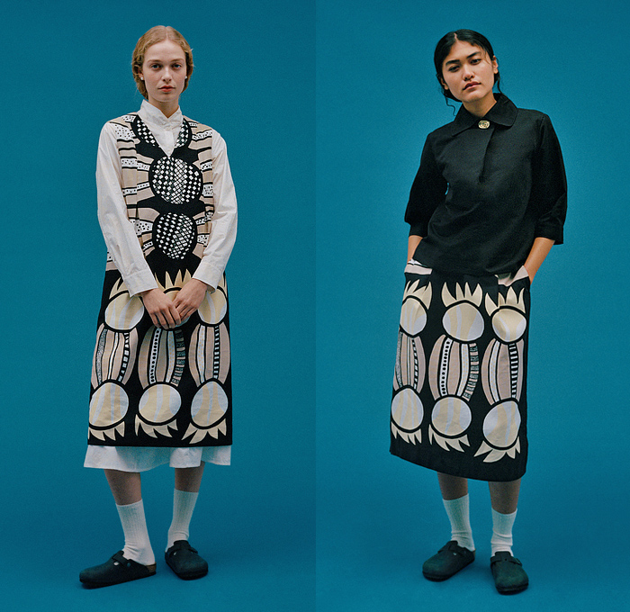 Marimekko 2022-2023 Fall Autumn Winter Womens Lookbook Presentation - Copenhagen Fashion Week CPHFW Denmark - Folk Costumes Tailoring Tribal Ethnic Geometric Pattern Dress Shirt Blouse Midi Skirt Shift Dress Bullseye Waves Coat Outerwear Robe Quilted Puffer Hoodie Parka Flowers Floral Onesie Shirtdress Scales Stripes Turtleneck Sweater Wide Leg Slouchy Pants Clogs