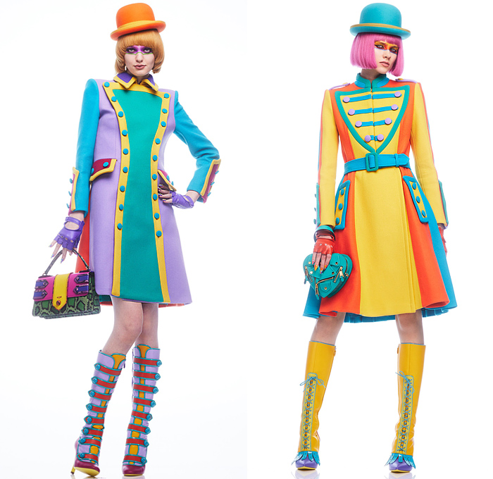 Moschino 2022 Pre-Fall Autumn Womens Lookbook Presentation - Colorblock Marching Band Drum Corps Military Blazer Coat Pantsuit Motorcycle Biker Jacket Poufy Shoulders Dress Shirtdress Shorts Miniskirt Accordion Pleats Stripes Corset Bustier Coins Cubes Prisms Zigzag Topography Swirls Sheer Tulle Halterneck Handbag Snakeskin Boots Opera Gloves Bowler's Hat Hobo Heart Bag Helmet Equestrian Mask