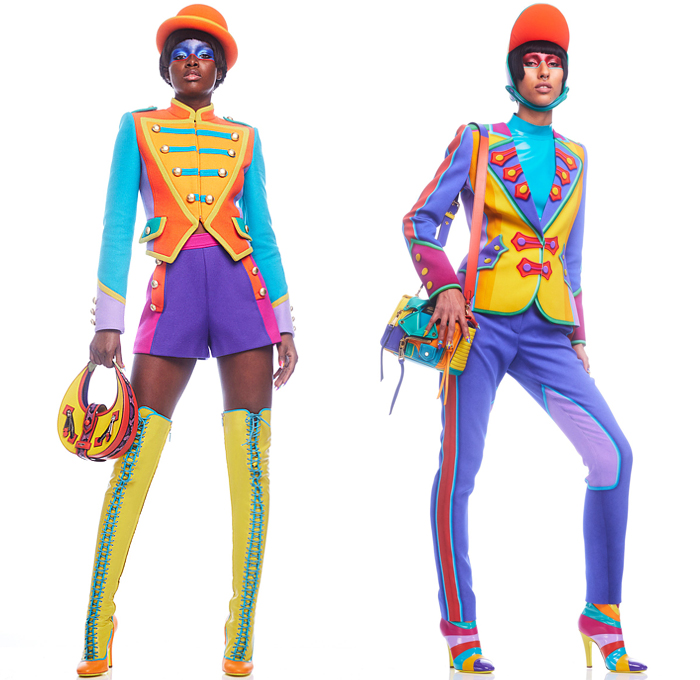 Moschino 2022 Pre-Fall Autumn Womens Lookbook Presentation - Colorblock Marching Band Drum Corps Military Blazer Coat Pantsuit Motorcycle Biker Jacket Poufy Shoulders Dress Shirtdress Shorts Miniskirt Accordion Pleats Stripes Corset Bustier Coins Cubes Prisms Zigzag Topography Swirls Sheer Tulle Halterneck Handbag Snakeskin Boots Opera Gloves Bowler's Hat Hobo Heart Bag Helmet Equestrian Mask