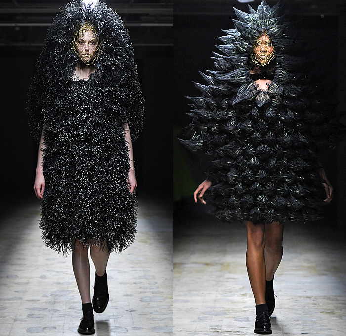 Noir Kei Ninomiya 2022-2023 Fall Autumn Winter Womens Runway Catwalk Looks - Paris Fashion Week Femme PFW - Fluorescent Neon Pink Green Yellow Organic Phosphorescent Sculpture Headwear Prismatic Spikes Wires Mask Chainmail Scales Belts Straps Harness Zipper Deconstructed Tiered Ruffles Sheer Tulle Tutu Skirt Dress Outerwear Coat Crop Top Midriff Detachable Sleeves Flowers Floral Blouse Long Sleeve Mesh Fishnet Fringes Pearls Safety Pins Puff Ball Bush Cocoon Gloves Oxfords