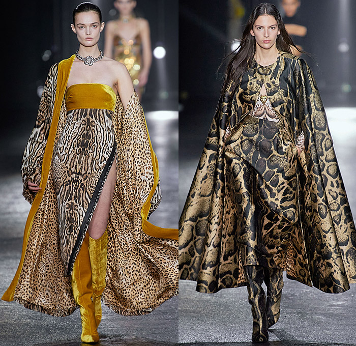 Roberto Cavalli 2022-2023 Fall Autumn Winter Womens Runway Looks - Milan Fashion Week Italy - Fausto Puglisi - Porcelain Boudoir Flowers Floral Roses Metal Bondage Belts Straps Rings Hooks Chain Cage Dress Strapless Cutout Leopard Cheetah Halterneck Bandeau Crop Top Biker Motorcycle Jacket Mullet Hem Draped Choker Velvet Studs Crystals Sequins Paillettes Plaid Check Ruffles Onesie Jumpsuit Trench Coat Robe Cape Blazer Fringes Tights Leggings Miniskirt Sheer Tulle Gown Boots Gloves