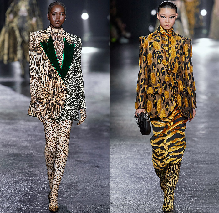 Roberto Cavalli 2022-2023 Fall Autumn Winter Womens Runway Looks - Milan Fashion Week Italy - Fausto Puglisi - Porcelain Boudoir Flowers Floral Roses Metal Bondage Belts Straps Rings Hooks Chain Cage Dress Strapless Cutout Leopard Cheetah Halterneck Bandeau Crop Top Biker Motorcycle Jacket Mullet Hem Draped Choker Velvet Studs Crystals Sequins Paillettes Plaid Check Ruffles Onesie Jumpsuit Trench Coat Robe Cape Blazer Fringes Tights Leggings Miniskirt Sheer Tulle Gown Boots Gloves