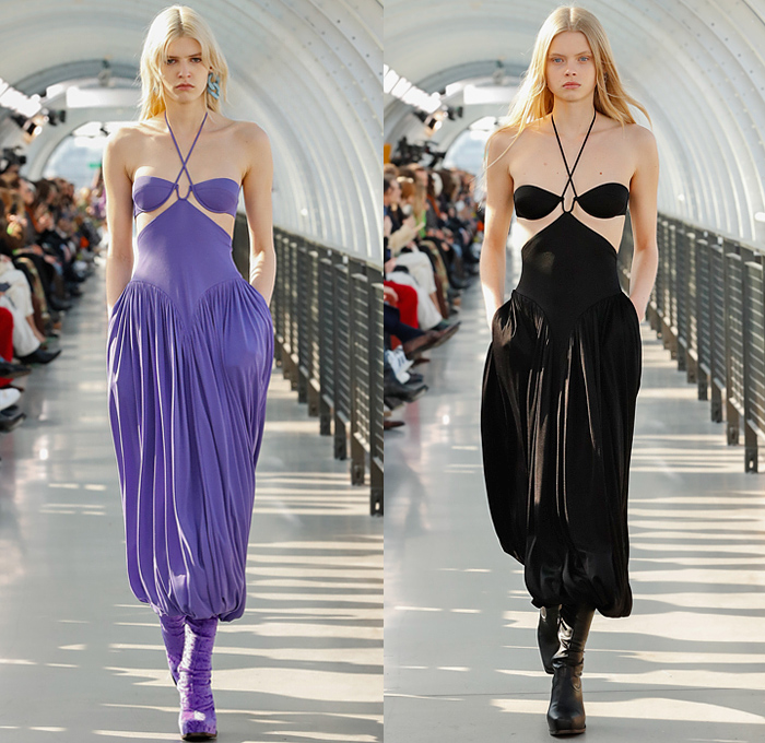 Stella McCartney 2022-2023 Fall Autumn Winter Womens Runway Looks - Paris Fashion Week Femme PFW - Frank Stella Gunmetal Fringes Colorblock Knit Vest Sweater Halterneck Noodle Strap Bralette Cutout Pleats Balloon Skirt Velvet Twist Tied Loungewear Cargo Pants Pockets Ruffles Capelet Art Abstract Dress Blazer Stripes V Series Onesie Jumpsuit Coveralls Midi Skirt Flocked Denim Jeans Pantsuit Coat Fur Shearling Oversized Frayme Bag Chain Cowboy Boots