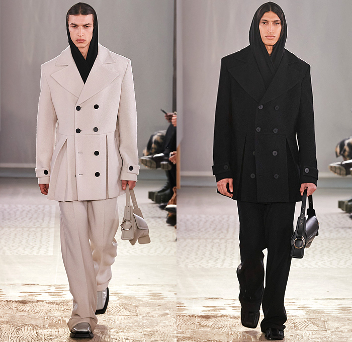 Trussardi 2022-2023 Fall Autumn Winter Mens Runway Looks - Milano Moda Donna Collezione Milan Fashion Week Italy - Chunky Knit Crochet Sweater Turtleneck Utility Pockets Cargo Pants Flare Denim Jeans Vest Pleats Quilted Puffer Outerwear Coat Oversized Hoodie Wide Lapel Suit Blazer Jacket Fur Shearling Velvet Zipper Wide Leg Baggy Loose Handbag