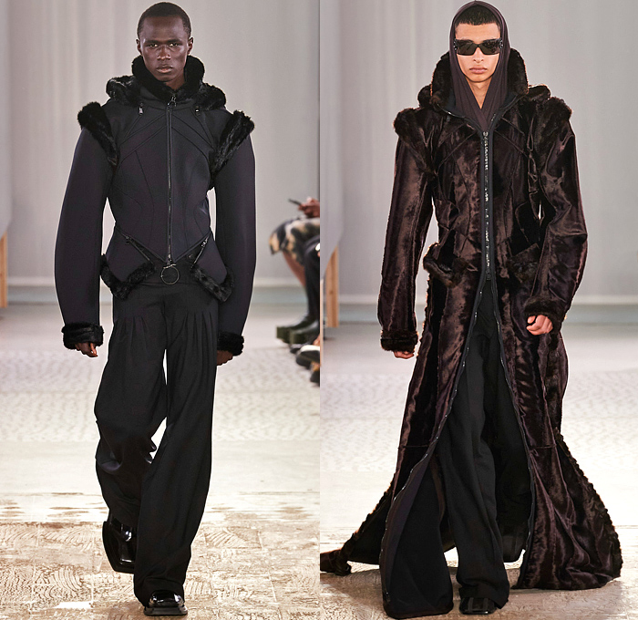 Trussardi 2022-2023 Fall Autumn Winter Mens Runway Looks - Milano Moda Donna Collezione Milan Fashion Week Italy - Chunky Knit Crochet Sweater Turtleneck Utility Pockets Cargo Pants Flare Denim Jeans Vest Pleats Quilted Puffer Outerwear Coat Oversized Hoodie Wide Lapel Suit Blazer Jacket Fur Shearling Velvet Zipper Wide Leg Baggy Loose Handbag