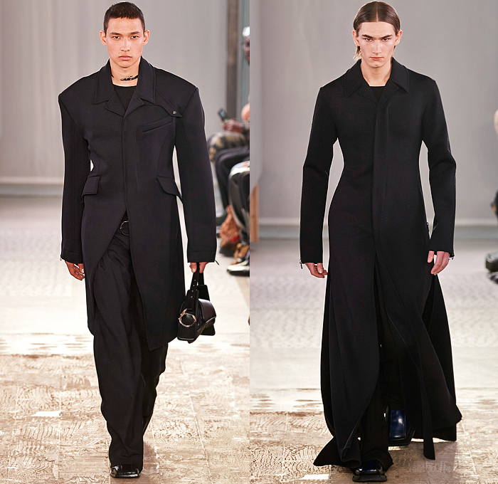 Trussardi 2022-2023 Fall Autumn Winter Mens Runway Looks - Milano Moda Donna Collezione Milan Fashion Week Italy - Chunky Knit Crochet Sweater Turtleneck Utility Pockets Cargo Pants Flare Denim Jeans Vest Pleats Quilted Puffer Outerwear Coat Oversized Hoodie Wide Lapel Suit Blazer Jacket Fur Shearling Velvet Zipper Wide Leg Baggy Loose Handbag