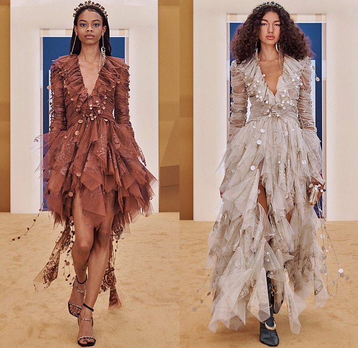 Zimmermann 2022-2023 Fall Autumn Winter Womens Runway Collection - New York Fashion Week NYFW - Stargazer Kaleidoscope Bell Sleeves Frills Tiered Ruffles Flare Shirtdress Leggings Knit Crochet Poncho Halterneck Lace Embroidery Patchwork Poufy Shoulders Puff Sleeves Leg O'Mutton Gown Flowers Floral Fringes Sheer Bomber Jacket Tassels Pompoms Capelet Polka Dots Stars Babydoll Dress Peacoat Coins Wide Leg Coat Shorts Plaid Check Denim Jeans Culottes Zodiac Signs Horoscope Bandeau Boots