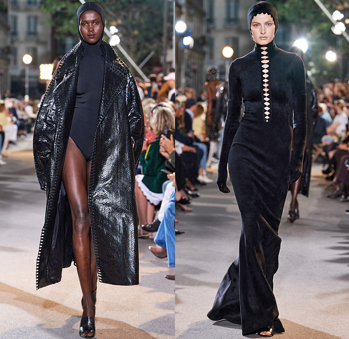 Alaïa Winter Spring 2022 Womens Runway Looks Collection - Draped Hood Denim Jeans Pantsuit Blazer Jacket Mesh Fishnet Coat Onesie Unitard Coveralls Bodysuit Jumpsuit Fringes Wide Sleeves Turtleneck Halterneck Dress Velvet Crop Top Midriff Body Contour Bodycon Fur Ribbed Knit Plastic Rainwear Parka Belt Corset Eyelets Metal Balls Bearings Bedazzled Beads Studs Poodle Skirt Shirtdress Miniskirt Sheer Tulle Gown Fringes Leggings Tights Gloves Handbag Tote Clogs