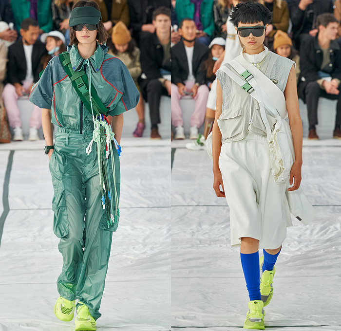 Lacoste 2022 Spring Summer Womens Runway Looks Collection - Mode à Paris Fashion Week France - Sporty Casual Athleisure Sunglasses Visor Hat Rainwear Coat Parka Anorak Knit Oversized Sweater Translucent Pockets Straps Belts Cords Tied Carabiner Mesh Track Jacket Shorts Culottes Cargo Pants Vest Logo Crop Top Midriff Neoprene Tennis Shirt Threads Frayed Raw Hem Patchwork Miniskirt Skirt Hotpants Socks Sneakers Sandals Handbag Bag Tote