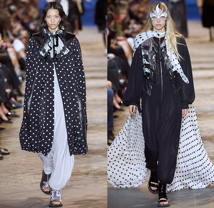 Louis Vuitton 2022 Spring Summer Womens Runway Looks Collection - Mode à Paris Fashion Week France - Mask Vampire Headwear Bedazzled Gems Crystals Sequins Studs Beads Mesh Lace Embroidery Crop Top Midriff Boxy Blazer Jacket Denim Jeans Noodle Strap Ruffles Sheer Tulle Organza Polka Dots Crinoline Skirt Victorian Quilted Puffer Coat Cape Cloak Vest Stripes Jodhpurs Equestrian Pants Cutout Puritan Collar Draped Dress Gown Culottes Open Toe Sandals Handbag Sunglasses