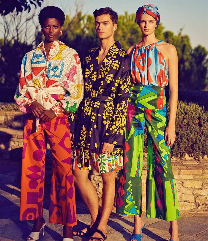 Rianna + Nina 2022 Spring Summer Womens Mens Lookbook Presentation - Mode à Paris Fashion Week France - Geometria 1960s Sixties Hollywood Villa Lace Embroidery Broderie Anglaise Kantha Caftan Kaftan Maxi Dress Pantsuit Blazer Jacket Geometric Tribal Shapes Ornaments Decorative Art Robe Coat Kimono Flare Wide Leg Palazzo Pants Blouse Sleeveless Tabard Vest Quilted Onesie Coveralls Jumpsuit Shorts Mesh Loungewear Bow Tied Flowers Floral Lion Swimwear Swimsuit Bikini Handbag Bag Tote