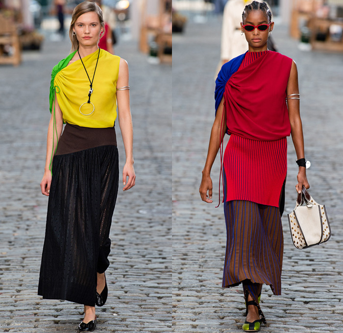 Tory Burch 2022 Spring Summer Womens Runway Catwalk Looks Collection - New York Fashion Week NYFW - Stripes Cap Sleeve Corset Shapewear Structured Madras Plaid Check Draped Cinch Drawstring Asymmetrical One Shoulder Color Block Sheer Eyelets Knit Silk Satin Wide Leg Pants Full Skirt Patchwork Panel Eyelets Mesh Cross Halterneck Logo Wide Collar Sailor Collar Coat Overcoat Lampshade Bucket Bag Tote Handbag Metal Studs Studded 