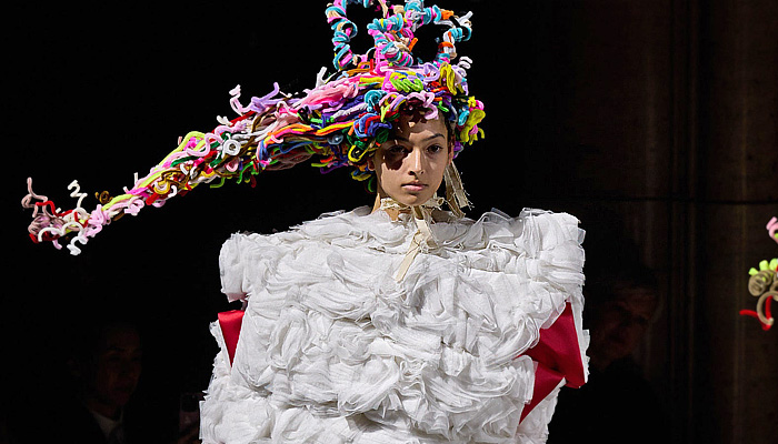 Comme des Garçons 2023-2024 Fall Autumn Winter Womens Runway Collection - Paris Fashion Week Femme PFW - Cone Head Headwear Fur Sculpture Rings Loops Grommets Holes Funnelneck Boxy Puff Ball Skirt Trompe L'oeil Rods Fringes Scrunchies Geometric Patchwork Deconstructed Judge Wig Cage Enclosed Wireframe Velvet Onion Bulbs Decorated Hood Tiered Ruffles Frills Lace Embroidery Rags Frayed Raw Hem Outerwear Coat Dress Gown