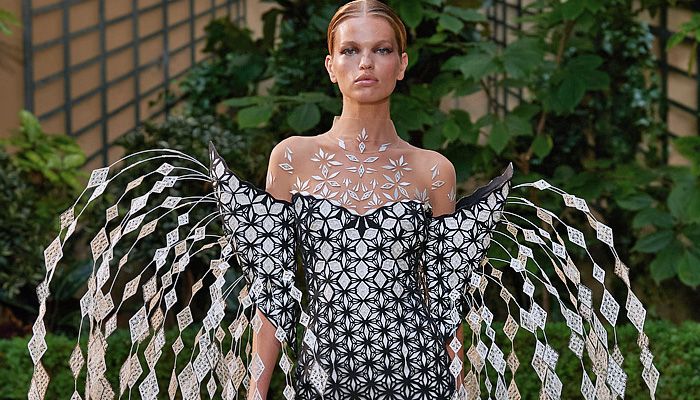 Iris van Herpen 2023-2024 Fall Autumn Womens Runway Looks - Haute Couture Avant Garde High Fashion - Architectonics Graphic Polygons Oceanix Fiberglass Rods Geodesic Bursts Aquatic Urbanism Shards Geometric Angular Sculpture Cutout Fringes Peacock Vase Sleeves One Shoulder Tiered Swirls Funnels Cones Halterneck Futuristic Medieval Sorceress Draped Halo Studs Furisode Kimono Sleeves Accordion Pleats Sheer Tulle Grill Armor Cape Dress Goddess Gown Headwear Tiara Mask