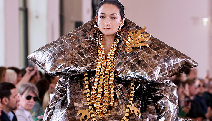 Schiaparelli 2023-2024 Fall Autumn Womens Haute Couture Runway Looks - Puff Ball Crop Top Midriff Trompe L'oeil Leaves Voluminous Shawl Sheer Tulle Curtain Draped Hair Giant Wooden Beads Hands Fringes Coat Paint Smudges Wide Lapel Gold Doves Keyhole Floppy Skirt Tights Stockings Headband Ears Blazer Sculpture Crystals Gems Branches Miniskirt Wires Loops Nuggets Tiles Mesh Stones Mirrors Safety Pins Gradient Turtleneck Corset Wide Leg Palazzo Pants Lace Apple Bag