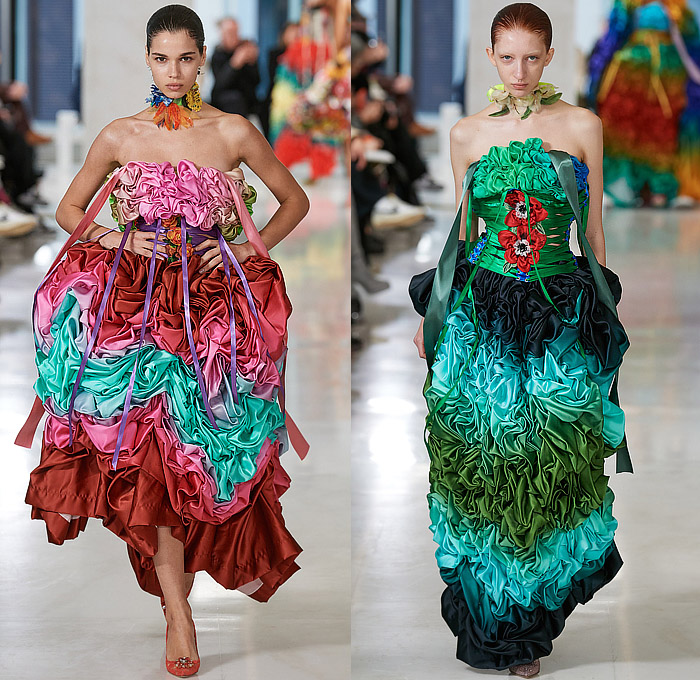 Tomo Koizumi 2023-2024 Fall Autumn Winter Womens Runway Looks - Milano Moda Donna Collezione Milan Fashion Week Italy - Supported By Dolce & Gabbana - Fiesta Festival Voluminous Sculpture Ruffles Frills Tiered Flowers Floral Trompe L'oeil Roman Soldiers Stripes Rainbow Bedazzled Studs Gems Sheer Tulle Crop Top Midriff Bralette Strapless Noodle Strap Laces Fringes Colorblock Gradient Ombré Cape Poodle Skirt Puff Ball Babydoll Dress Gown Train Draped Gladiator Handbag Tote