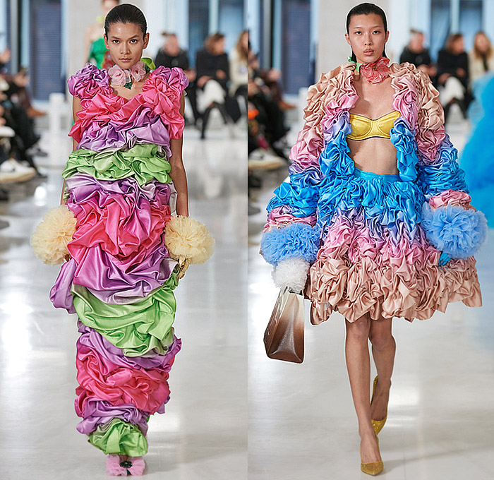 Tomo Koizumi 2023-2024 Fall Autumn Winter Womens Runway Looks - Milano Moda Donna Collezione Milan Fashion Week Italy - Supported By Dolce & Gabbana - Fiesta Festival Voluminous Sculpture Ruffles Frills Tiered Flowers Floral Trompe L'oeil Roman Soldiers Stripes Rainbow Bedazzled Studs Gems Sheer Tulle Crop Top Midriff Bralette Strapless Noodle Strap Laces Fringes Colorblock Gradient Ombré Cape Poodle Skirt Puff Ball Babydoll Dress Gown Train Draped Gladiator Handbag Tote
