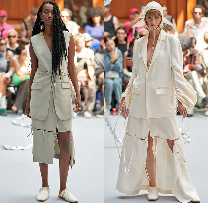 Holzweiler 2023 Spring Summer Womens Runway Collection Looks - Copenhagen Fashion Week Denmark CPHFW København - In Motion - Nylon Trackwear Onesie Jumpsuit Coveralls Zipper Blouse Bandeau Crop Top Midriff Top Panels Fringes Frayed Raw Hem Vest Tabard Tied Drawstring Cinch Blazer Marbled Grommets Noodle Strap Dress One Shoulder Blurry Flowers Floral Harness Braid Knit Crochet Mesh Sweater Holes Wide Leg Flare Skirt Cape Handmaid Hat Fanny Pack Pouch Bag Clogs Straw Hat Boots