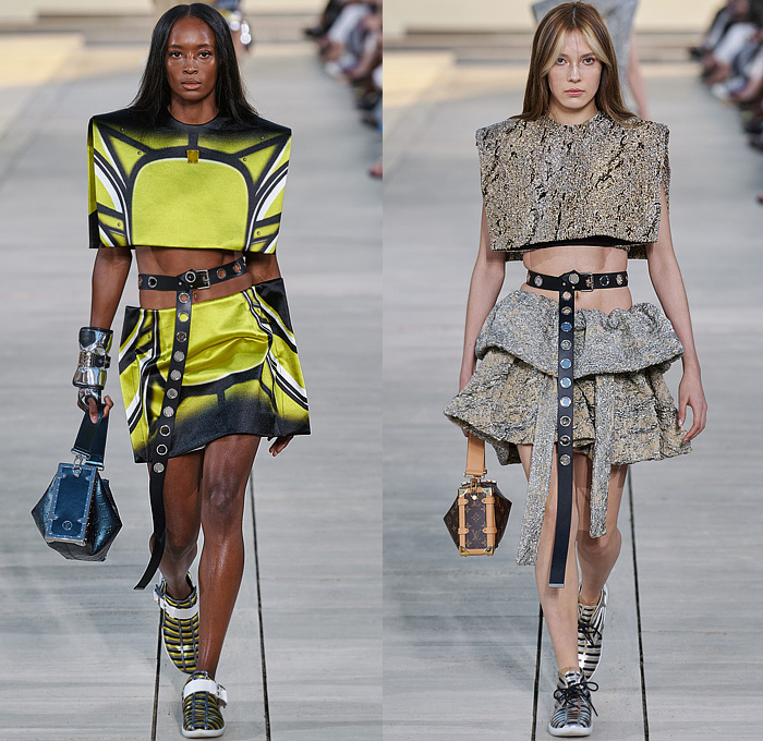 Louis Vuitton 2023 Resort Cruise Pre-Spring Womens Runway Catwalk Looks - Greek Goddess Mythology Amazon Warrior Medieval Armor Scales Cross Vest Deconstructed Belt Gold Feathers Embossed Brocade Jacquard Tiles Knit Fringes Draped Crop Top Midriff Capsleeve Boxy Frankenstein Shoulders Marbled Sequins Hood Wide Lapel Skirt Metal Linen Tweed Tapered Denim Jeans Zipper Anorak Sheer Tulle Leather Chain Pockets Biker Jacket Coat Dress Gown Handbag Studs Boots Gloves Sneakers Aviator Cap