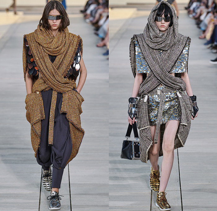 Louis Vuitton 2023 Resort Cruise Pre-Spring Womens Runway Catwalk Looks - Greek Goddess Mythology Amazon Warrior Medieval Armor Scales Cross Vest Deconstructed Belt Gold Feathers Embossed Brocade Jacquard Tiles Knit Fringes Draped Crop Top Midriff Capsleeve Boxy Frankenstein Shoulders Marbled Sequins Hood Wide Lapel Skirt Metal Linen Tweed Tapered Denim Jeans Zipper Anorak Sheer Tulle Leather Chain Pockets Biker Jacket Coat Dress Gown Handbag Studs Boots Gloves Sneakers Aviator Cap