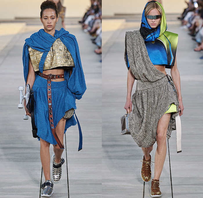 Louis Vuitton 2023 Resort Cruise Pre-Spring Womens Runway Catwalk Looks - Greek Goddess Mythology Amazon Warrior Medieval Armor Scales Cross Vest Deconstructed Belt Gold Feathers Embossed Brocade Jacquard Tiles Knit Fringes Draped Crop Top Midriff Capsleeve Boxy Frankenstein Shoulders Marbled Sequins Hood Wide Lapel Skirt Metal Linen Tweed Tapered Denim Jeans Zipper Anorak Sheer Tulle Leather Chain Pockets Biker Jacket Coat Dress Gown Handbag Studs Boots Gloves Sneakers Aviator Cap