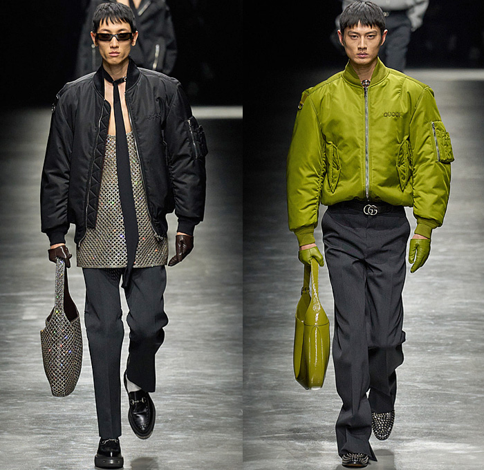 Gucci 2024-2025 Fall Autumn Winter Mens Runway Looks - Milano Moda Uomo Milan Fashion Week - Ancora - Bedazzled Studs Crystals Tank Top Choker Silk Neck Tie Knit Sweater Jumper Wide Collar Cardigan Logo GG Monogram Double-Breasted Hidden Buttons Suit Blazer Creases Ribbed Bomber Jacket Pockets Outerwear Long Coat Quilted Puffer Fur Fringes Tabard Snakeskin Stripes Denim Jeans Gloves Hobo Bag Horsebit Loafers Creeper Soles