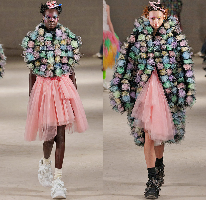 Noir Kei Ninomiya 2024-2025 Fall Autumn Winter Womens Collection - Paris Fashion Week PFW - Iridescence - Flowers Floral Plaid Check Studs Harness Vest Blazer Skirt Bows Safety Pins Trench Coat Robe Bicycle Shorts Paisley Weave Mesh Bomber Jacket Quilted Puffer Icicles Feathers Rainbow Gown Sheer Tulle Furry Keycaps Sculpture Radiant Color Samples Paint Fan Frankenstein Shoulders Pinafore Dress Cape Stained Glass Chandelier Wires Loops Coils Velvet Reebok Instapump Fury Trainers