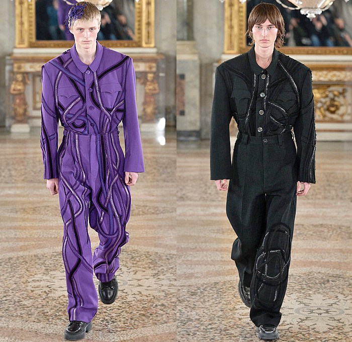 Pronounce 2024-2025 Fall Autumn Winter Mens Runway Looks - Milano Moda Uomo Milan Fashion Week - Butterflies Metal Pins Insect Flight Paths Traces Scrap Fabrics Recycled Cartoon Comics Drawings Vest Wool Long Sleeve Shirt Mao Suit Rope Piping Trompe L'oeil Embroidery Lines Swirls Suit Blazer Jacket Fleece Outerwear Coat Hood Sweaterdress Onesie Cargo Pants Utility Pockets Wide Leg Denim Jeans Knit Cap Ear Flaps Sneakers Trainers Oversized Messenger Bag