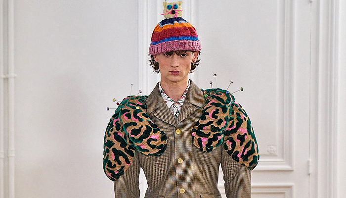 Walter Van Beirendonck 2024-2025 Fall Autumn Winter Mens Runway - Paris Fashion Week Homme Automne Hiver - Banana Wink Boom - Action Figure Toy Hair Headwear Paper Doll Cutout Blazer Volcano Flowers Floral Plaid Check Bomber Jacket Stripes Insect Arms Brain Pattern Pins Football Shoulders Padded Furry Fringes Cannonball Hole Balaclava Robe Coat Patchwork Leggings Snake Worm Scarf Knit Sweater Cartoon Quilted Puffer Jogger Sweatpants Shorts Handbag Legs Sneakers Gloves Boots