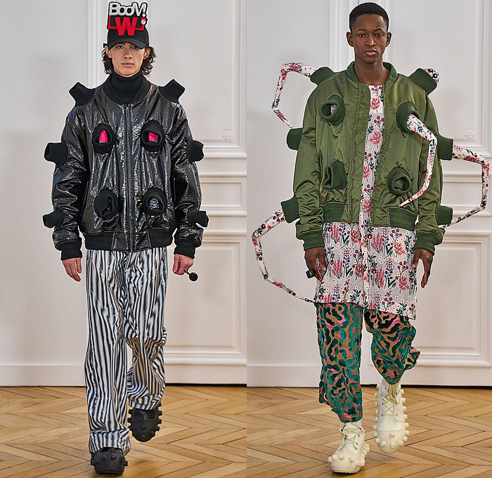 Walter Van Beirendonck 2024-2025 Fall Autumn Winter Mens Runway - Paris Fashion Week Homme Automne Hiver - Banana Wink Boom - Action Figure Toy Hair Headwear Paper Doll Cutout Blazer Volcano Flowers Floral Plaid Check Bomber Jacket Stripes Insect Arms Brain Pattern Pins Football Shoulders Padded Furry Fringes Cannonball Hole Balaclava Robe Coat Patchwork Leggings Snake Worm Scarf Knit Sweater Cartoon Quilted Puffer Jogger Sweatpants Shorts Handbag Legs Sneakers Gloves Boots