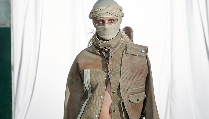 Deadwood 2024 Spring Summer Womens Mens Runway Collection - Copenhagen Fashion Week Denmark CPHFW København - Uplifted - Vintage Upcycled Deadstock Leather Recycled Crop Top Midriff Miniskirt Bomber Motorcycle Biker Moto Jacket Patchwork Terra Cotta Utility Pockets Deconstructed Head Wrap Balaclava Straps Belts Slouchy Wide Leg Outerwear Coat Shoelaces Dress Cargo Shorts Quilted Puffer Scarf Asymmetrical Shoulder Sleeve Zipper Skirt Leg Warmers Desert Boots