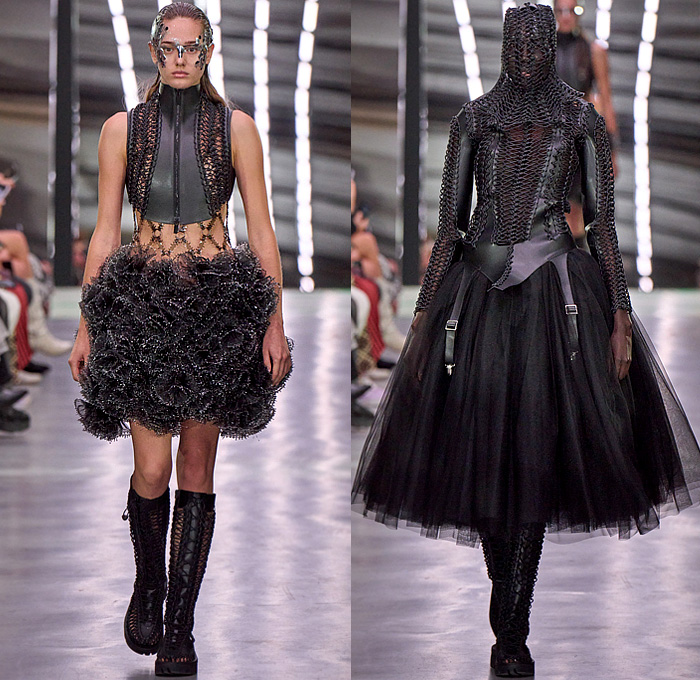 Noir Kei Ninomiya 2024 Spring Summer Womens Runway Collection - Paris Fashion Week PFW - Keen Rope Braid Mesh Medieval Helmet Vest Clips Harness Suspenders Brace Loops Rings Sheer Tulle Tutu Ruffles Frills Sculpture Voluminous Straps Belts Poufy Shoulders Blouse Shorts Stripes Accordion Pleats Miniskirt Bell Sleeves Wide Leg Detachable Cross Hatch Fringes Puritan Collar Metallic Crystals Spikes Dress Strapless Puff Ball Branches Leaves Wires Lace Coils Boots Loafers Tassels 