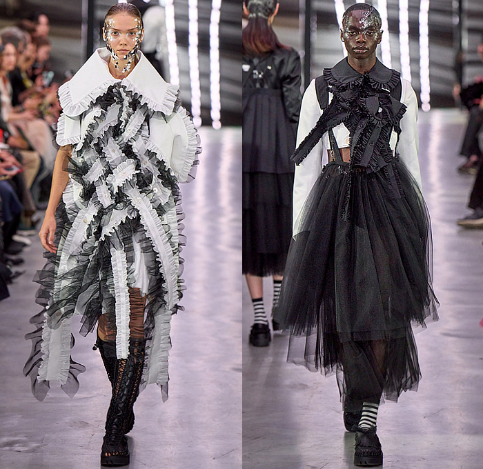 Noir Kei Ninomiya 2024 Spring Summer Womens Runway Collection - Paris Fashion Week PFW - Keen Rope Braid Mesh Medieval Helmet Vest Clips Harness Suspenders Brace Loops Rings Sheer Tulle Tutu Ruffles Frills Sculpture Voluminous Straps Belts Poufy Shoulders Blouse Shorts Stripes Accordion Pleats Miniskirt Bell Sleeves Wide Leg Detachable Cross Hatch Fringes Puritan Collar Metallic Crystals Spikes Dress Strapless Puff Ball Branches Leaves Wires Lace Coils Boots Loafers Tassels 