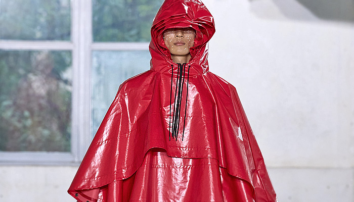 Rains 2024 Spring Summer Mens Runway Collection Lookbook Presentation - Paris Fashion Week Homme Mode Masculine Printemps Eté - Drenched Rainwear Raincoat Oversized Outerwear Coat Parka Poncho Fringes Strings Hood Tiered Shorts Crumpled Wrinkled Plastic Nylon Water-Repellent Waterproof Water-Resistant Crop Top Midriff Leg Warmers Puffer Sneakers Boots