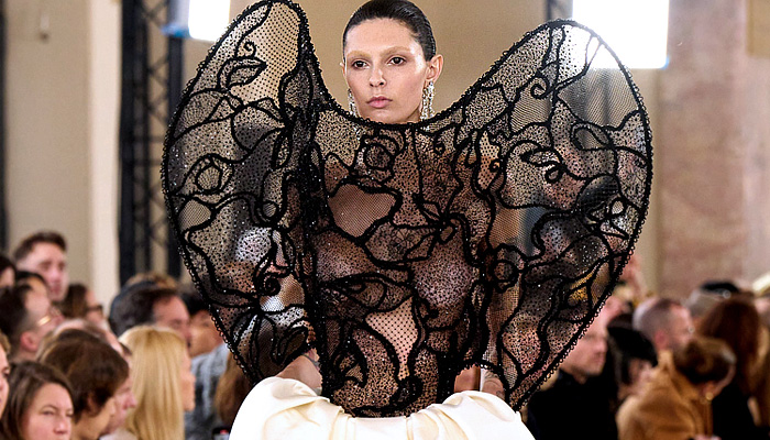 Schiaparelli 2024 Spring Couture Womens Runway Collection - Haute Couture High Fashion - Schiaparalien - Embroidery Petals Sequins Dress Crystals Dressage Equestrian Knots Spikes Motherboard Leather Denim Camel Suede Bomber Jacket Horsetail Lace Velvet Fringes Buckles Belts Sculpture Mesh Keyhole Cargo Pants Wide Leg Rounded Shoulders Miniskirt Anatomy Exoskeleton Necklace Strapless Bustier Corset Bunny Ears Gown Draped Puff Ball Pantsuit Cutout Bandanna Heels Cowboy Boots