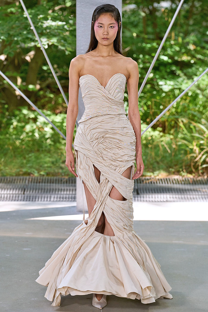 ArdAzAei Fall 2025 Couture runway look – sea urchin-inspired silk gown with sculptural marine details in pastel tones