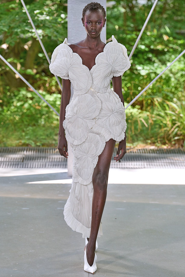 ArdAzAei Fall 2025 Couture runway look – sea urchin-inspired silk gown with sculptural marine details in pastel tones