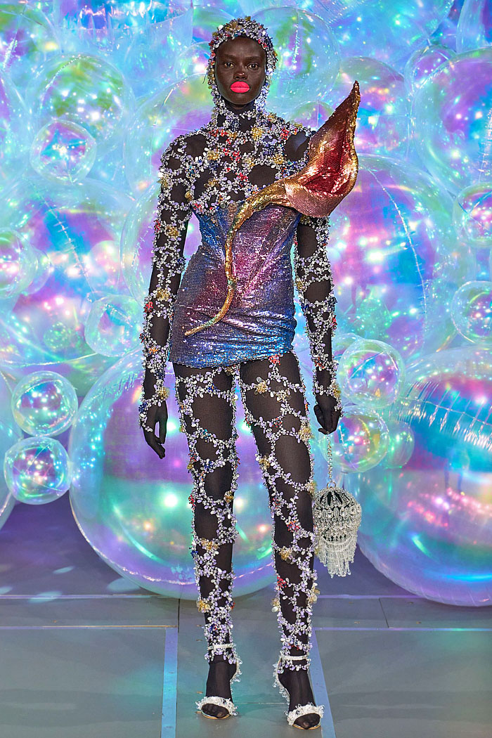 Germanier Les Joueuses Fall 2025 Couture Fashion: bedazzled sequins, crystals, pompoms, balloon gowns, recycled plastic, Hello Kitty details.