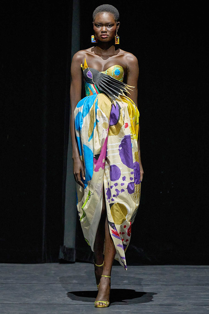 Ronald van der Kemp Fall 2025 Couture: birds, fish, banana leaves, gold corset bustiers, brocade gowns, patchwork knit scraps