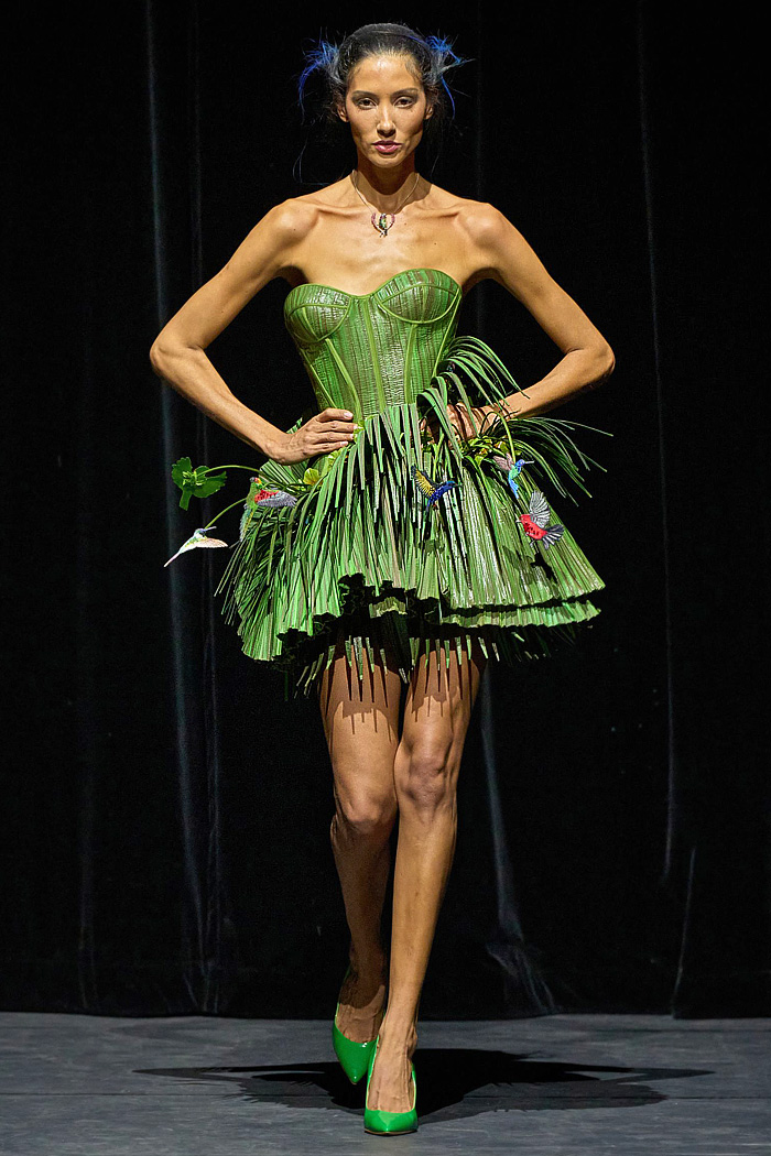 Ronald van der Kemp Fall 2025 Couture: birds, fish, banana leaves, gold corset bustiers, brocade gowns, patchwork knit scraps