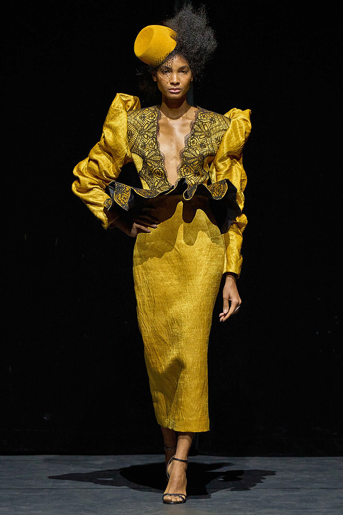 Ronald van der Kemp Fall 2025 Couture: birds, fish, banana leaves, gold corset bustiers, brocade gowns, patchwork knit scraps