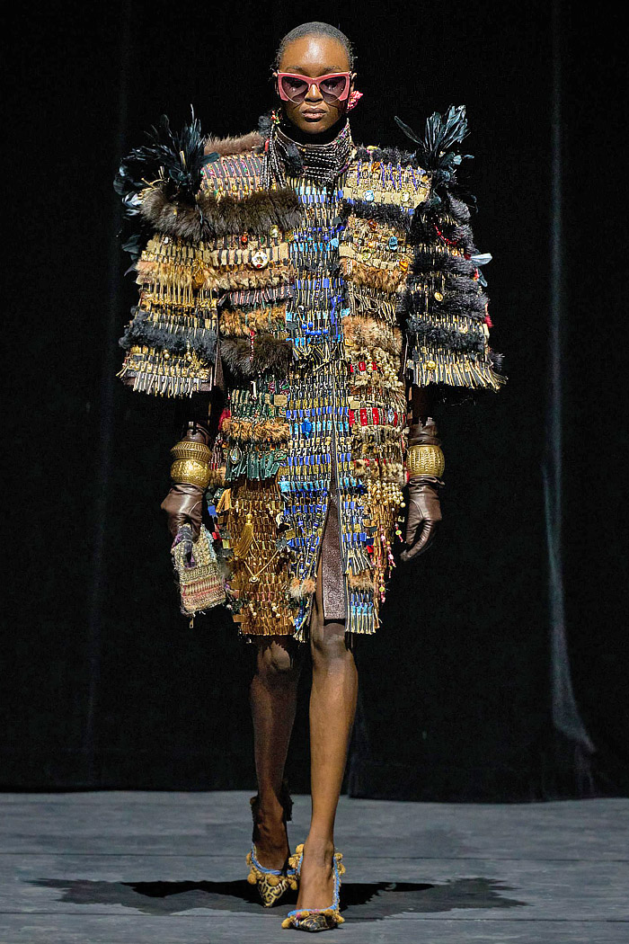 Ronald van der Kemp Fall 2025 Couture: birds, fish, banana leaves, gold corset bustiers, brocade gowns, patchwork knit scraps