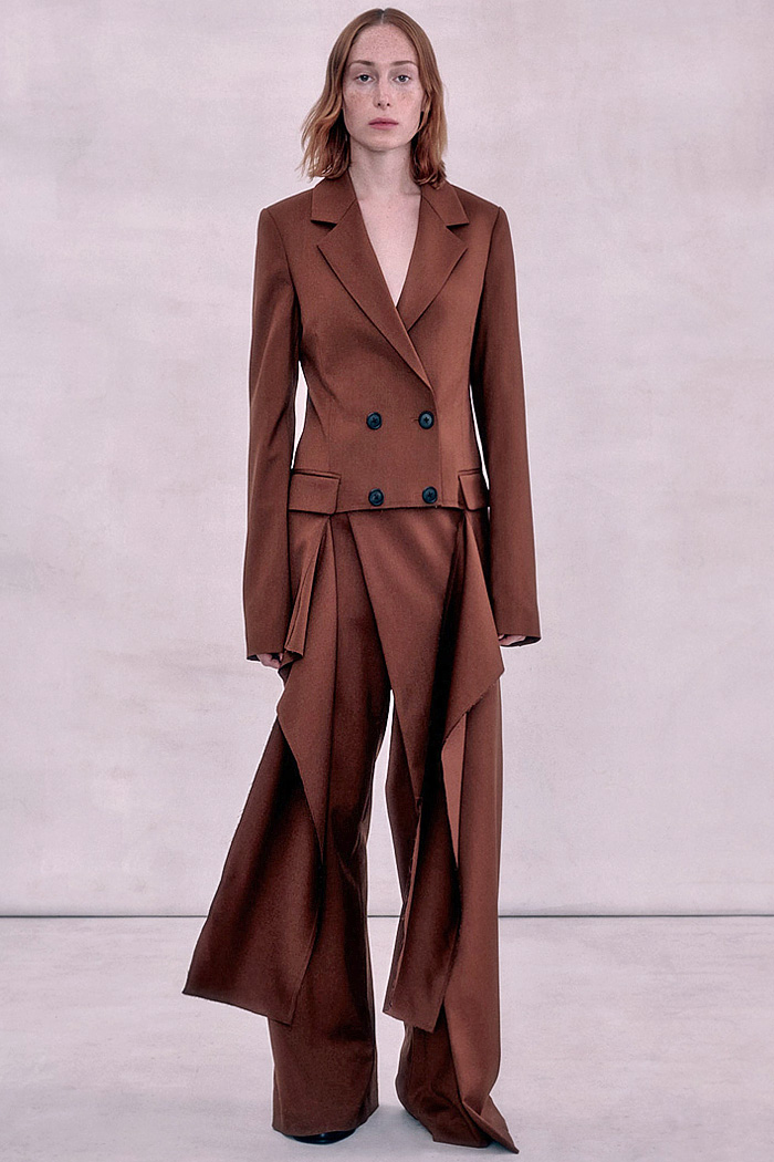 2025 Pre-Fall women's blazers and pantsuits: bold tailoring, lace, geometric, monograms, puffer hybrids, and standout designer cuts.