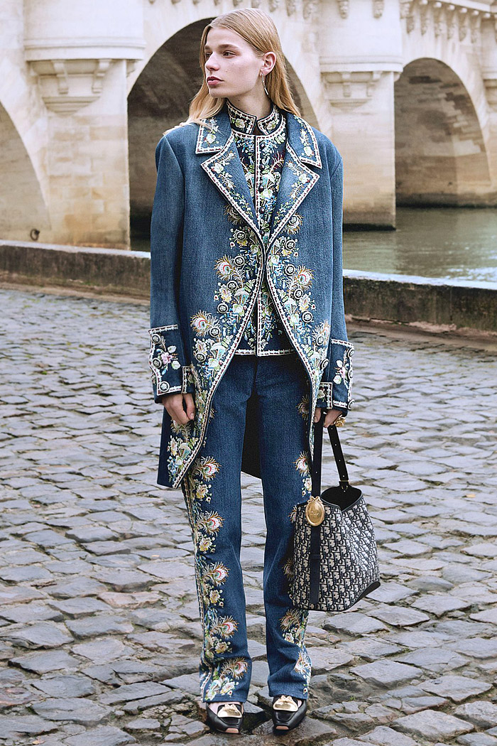 Christian Dior 2026 Pre-Fall Autumn Womens Fashion Trends Looks - Denim Jeans, Ostrich Feathers, Flowers Floral Embroidery, Hybrid Skirtpants, Wide Leg Baggy, Looped Ribbons, Geometric Angular, Concave Cutout Hem Tuxedo Jacket, Draped Curtain, Giant Bows, Capes, Houndstooth, Patchwork, Hoods Christian Dior 2026 Pre-Fall Womens Fashion Trends - Denim Jeans, Embroidery, Baggy, Ribbons, Tux, Draped Curtain, Bows, Capes
