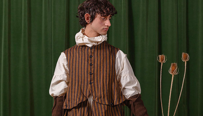 Tíscar Espadas 2026-2027 Fall Autumn Winter Mens Fashion Trends - Capítulo VIII - Rural Switzerland, denim, jeans, manskirt, oversized pockets, jester, medieval, slit shorts, vest, deadstock fabrics, stripes, organic linen, outerwear, coat, detachable collar, ambiguous tie, peek-a-boo necktie, wide leg, baggy, loose, corduroy, funnel neck, work boots Tíscar Espadas 2026-2027 Fall Autumn Winter Mens Fashion - denim, jeans, oversized, jester, vest, deadstock, necktie, wide leg