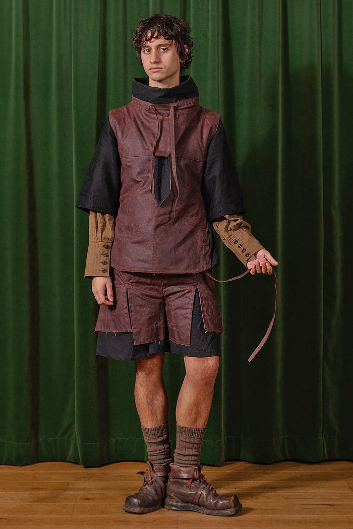 Tíscar Espadas 2026-2027 Fall Autumn Winter Mens Fashion Trends - Capítulo VIII - Rural Switzerland, denim, jeans, manskirt, oversized pockets, jester, medieval, slit shorts, vest, deadstock fabrics, stripes, organic linen, outerwear, coat, detachable collar, ambiguous tie, peek-a-boo necktie, wide leg, baggy, loose, corduroy, funnel neck, work boots Tíscar Espadas 2026-2027 Fall Autumn Winter Mens Fashion - denim, jeans, oversized, jester, vest, deadstock, necktie, wide leg