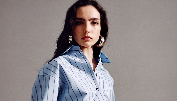 3.1 Phillip Lim 2026 Resort Cruise Pre-Spring Womens Lookbook - Outerwear Parka Field Jacket Coat Utility Pockets Denim Jeans Cargo Pants Knit Cardigan Sweater Jumper Pinstripe Shirtdress Cinch Strings Drawstring Dress Leopard Cape Shawl Bedazzled Sequins Lace Embroidery Crop Top Midriff Midi Skirt Snap Buttons Tearaway Peplum Wide Leg Quilted Puffer Miniskirt Asymmetrical Flats Clogs Snakeskin Studs Handbag Bag Tote