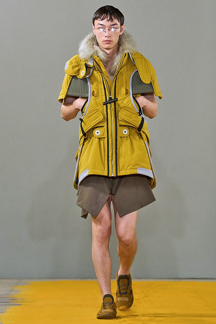 Craig Green 2026 Spring Summer Mens Runway - Vest, Straps, Fred Perry Collab, Knit Fringes, Skirt Shorts, Flowers, and Rainwear